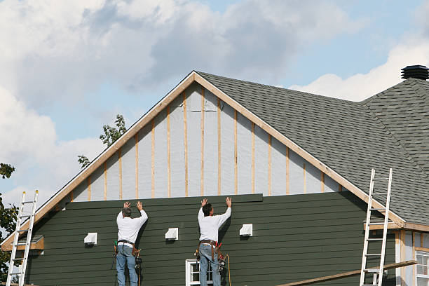 Professional Siding Contractor technician working in Withams, VA
